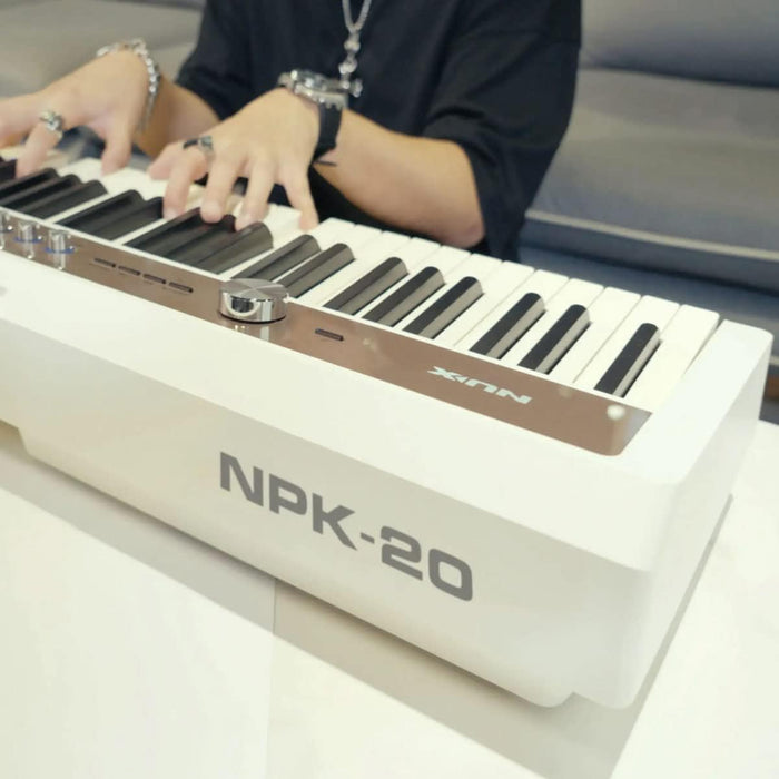 NPK-20 Portable Digital Piano with Triple-Sensor Hammer Action Keyboard